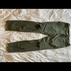 Green distressed ripped jeans